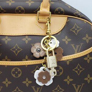 Authentic Louis Vuitton Lock & Key with Unbranded Flower Charm, Keychain